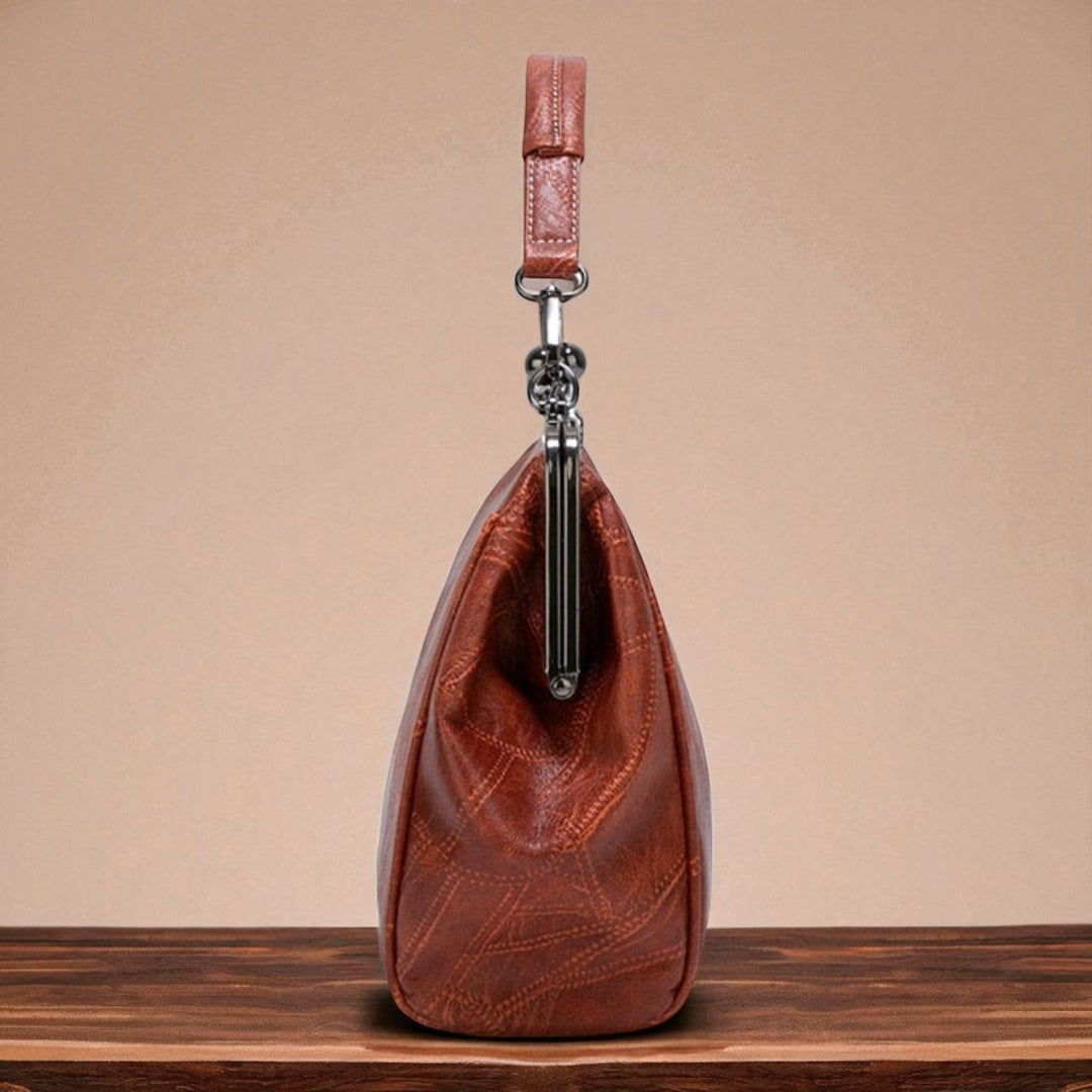 Bolso vintage com fecho a pressão