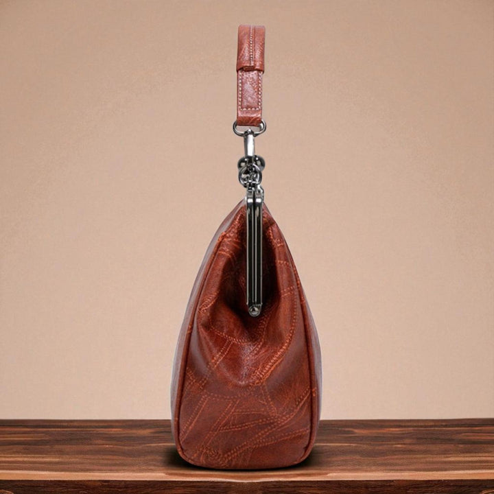 Bolso vintage com fecho a pressão
