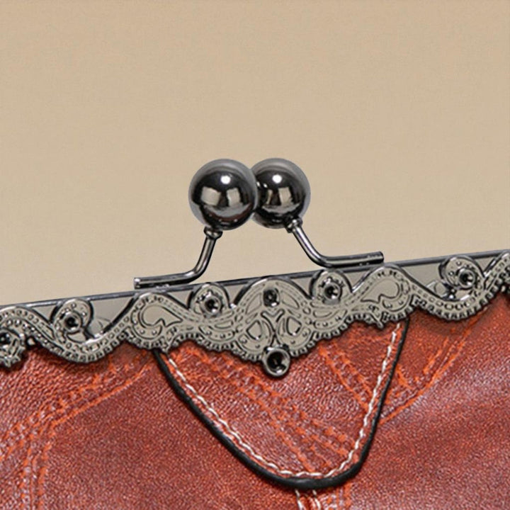 Bolso vintage com fecho a pressão