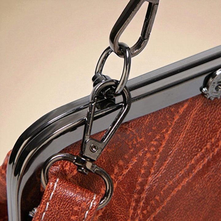 Bolso vintage com fecho a pressão