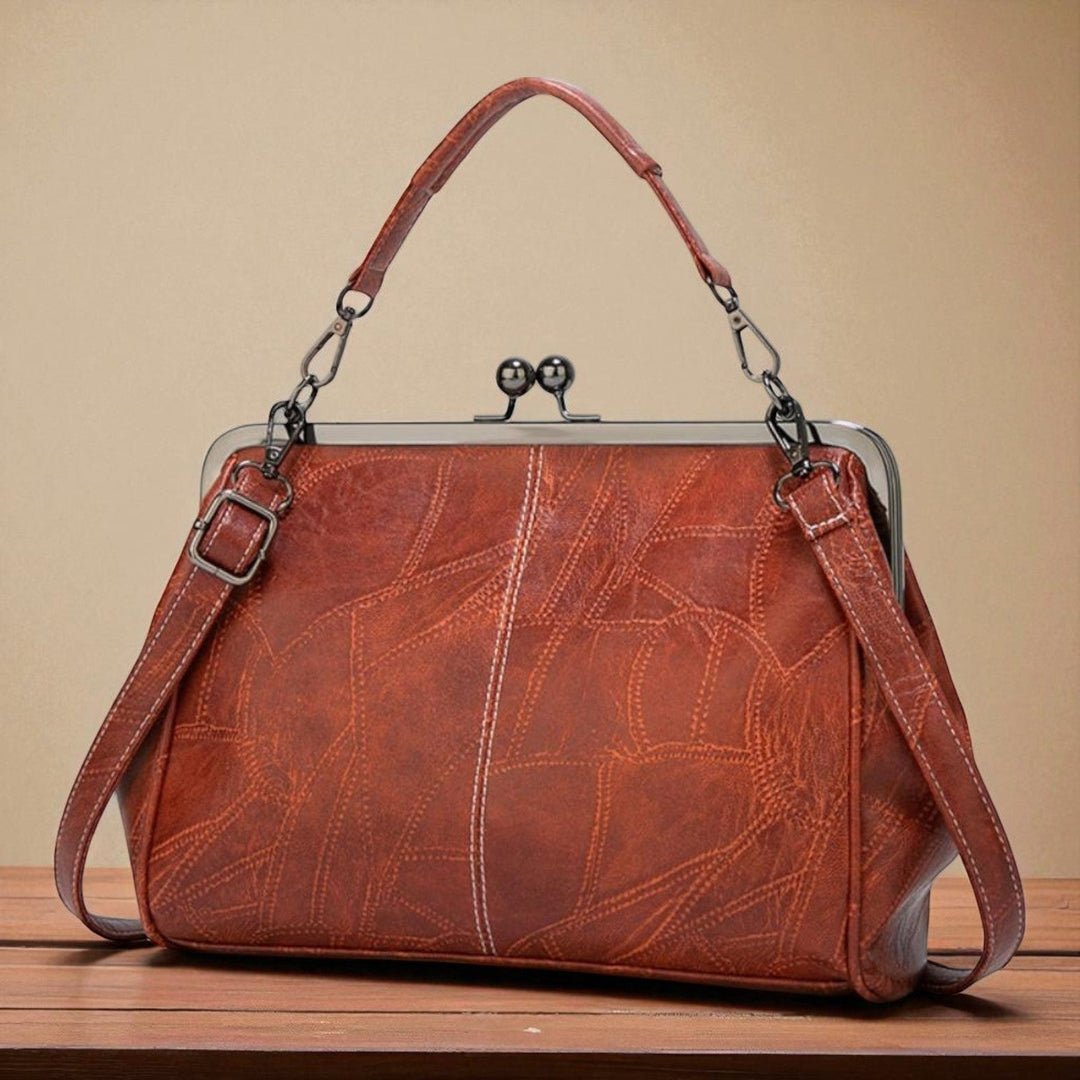 Bolso vintage com fecho a pressão