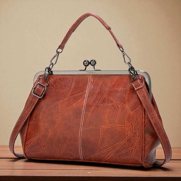 Bolso vintage com fecho a pressão
