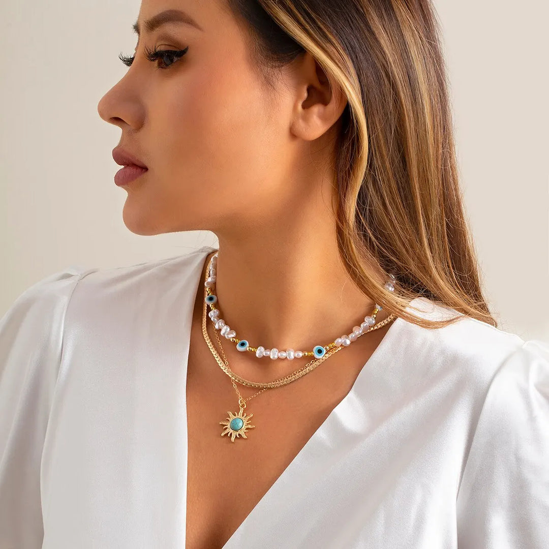 Conjunto de Colares em Camadas Parel & Olho Maligno – Pendente Sol Boho