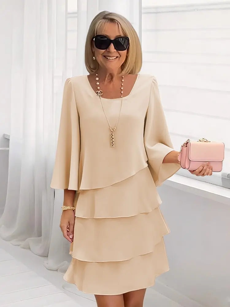 Elsa – Vestido elegante e fluido com volantes