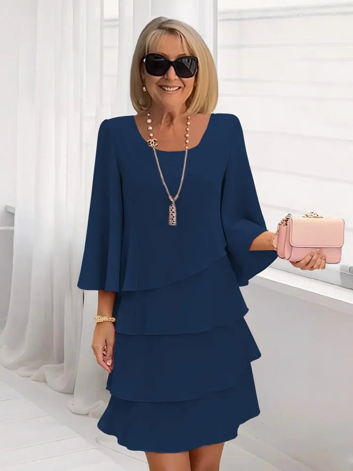 Elsa – Vestido elegante e fluido com volantes