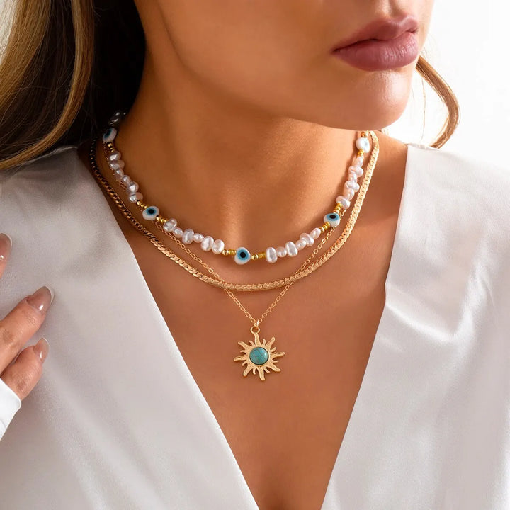 Conjunto de Colares em Camadas Parel & Olho Maligno – Pendente Sol Boho