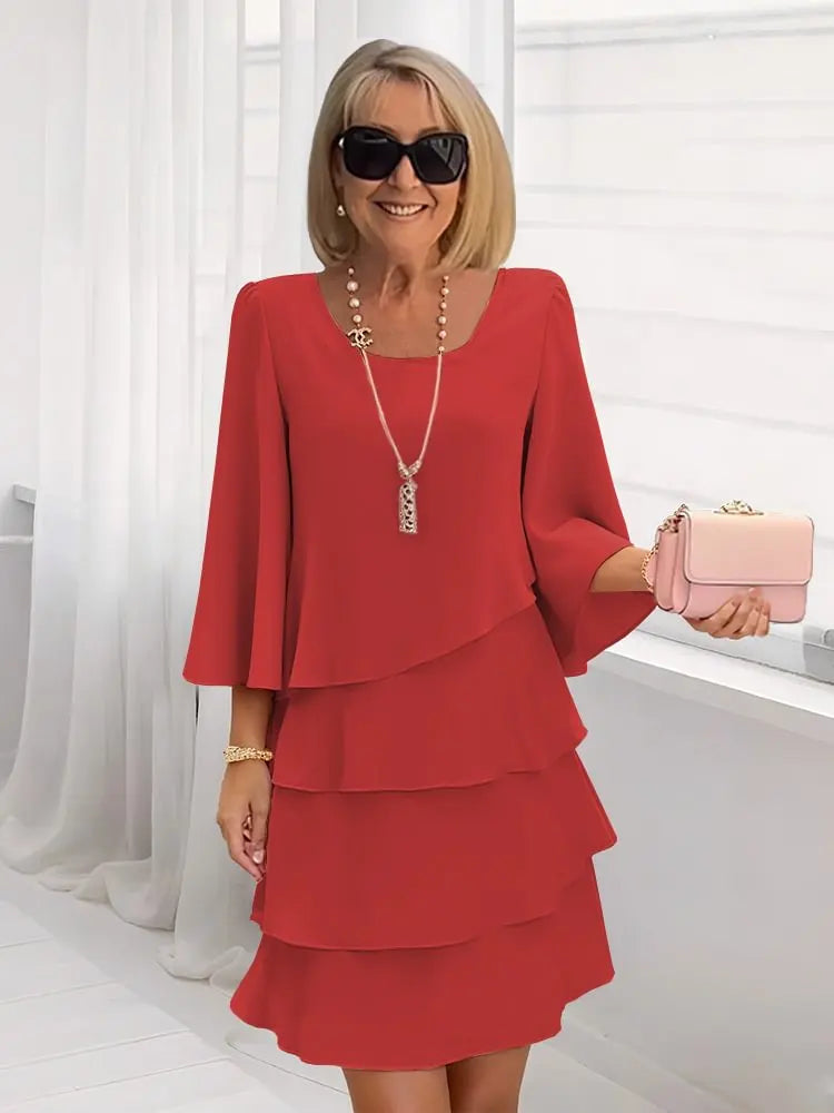 Elsa – Vestido elegante e fluido com volantes