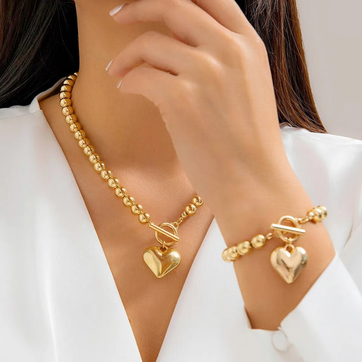 Conjunto de pulseira e colar com pendente em forma de coração em pérolas de 2 peças