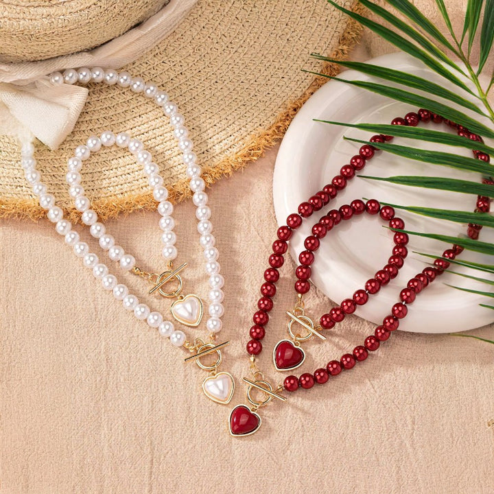 Conjunto de pulseira e colar com pendente em forma de coração em pérolas de 2 peças