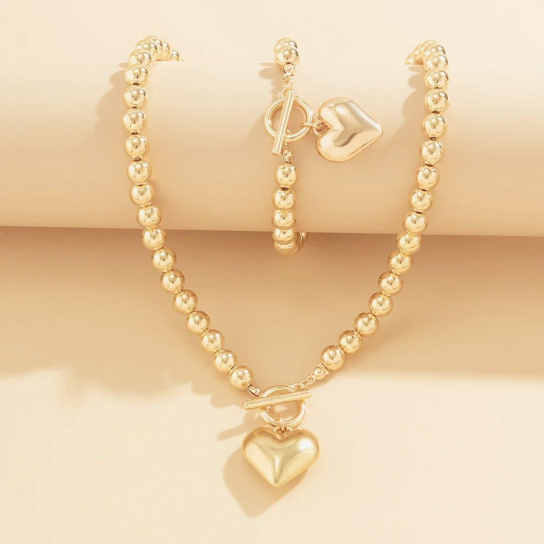 Conjunto de pulseira e colar com pendente em forma de coração em pérolas de 2 peças