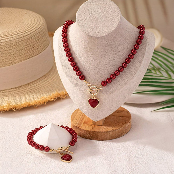 Conjunto de pulseira e colar com pendente em forma de coração em pérolas de 2 peças
