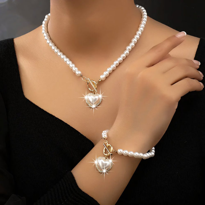 Conjunto de pulseira e colar com pendente em forma de coração em pérolas de 2 peças