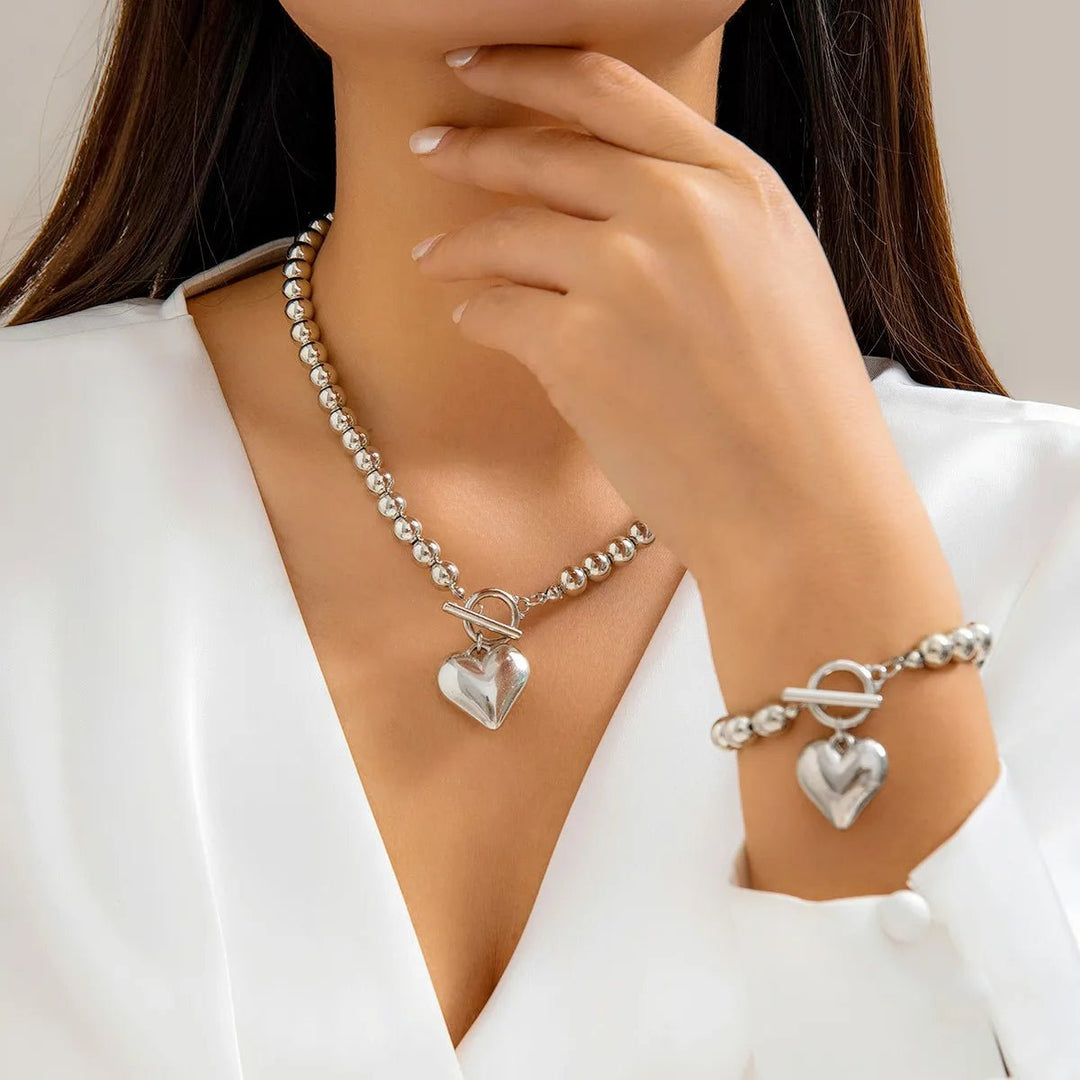 Conjunto de pulseira e colar com pendente em forma de coração em pérolas de 2 peças