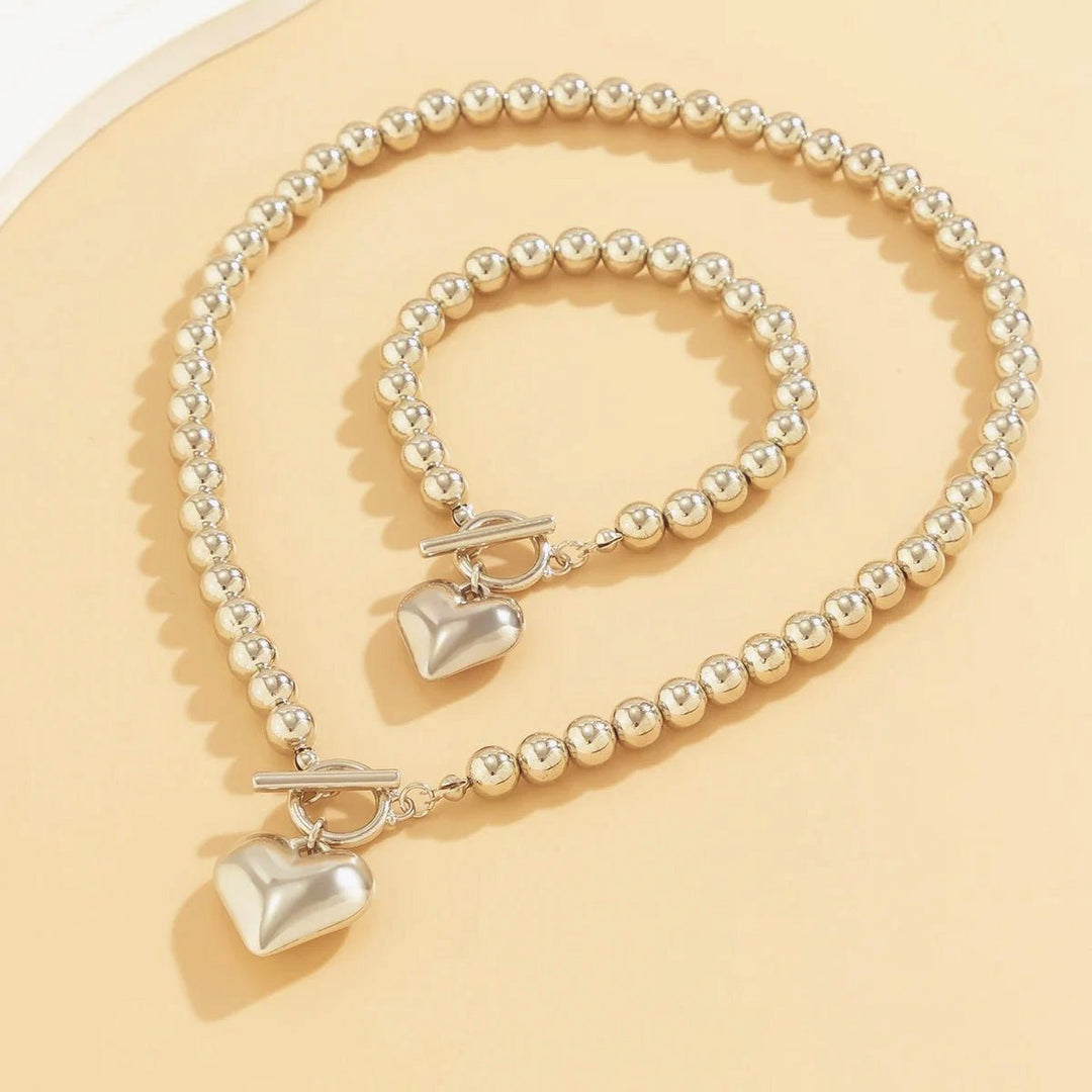 Conjunto de pulseira e colar com pendente em forma de coração em pérolas de 2 peças