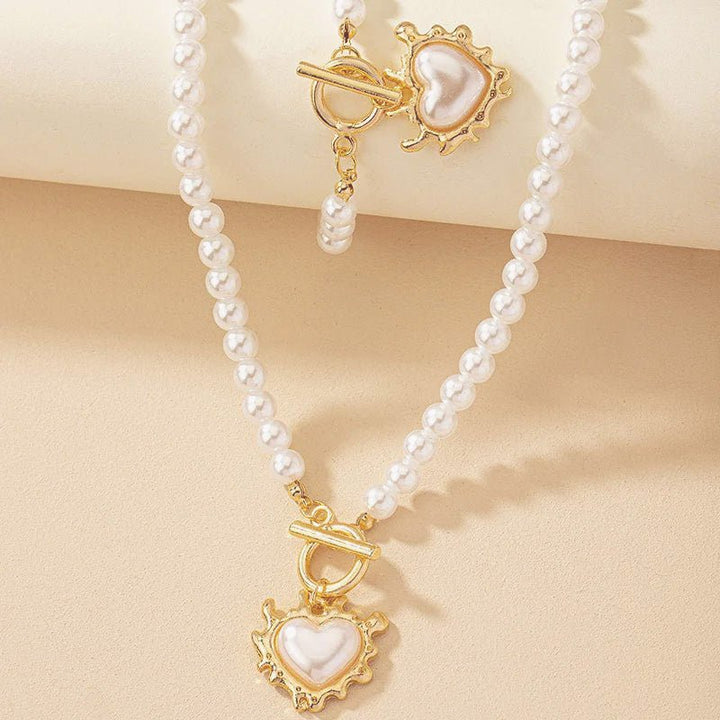Conjunto de pulseira e colar com pendente em forma de coração em pérolas de 2 peças
