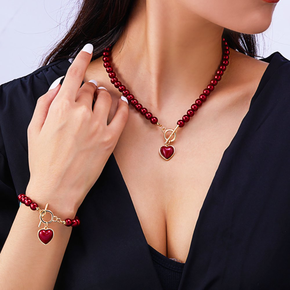 Conjunto de pulseira e colar com pendente em forma de coração em pérolas de 2 peças