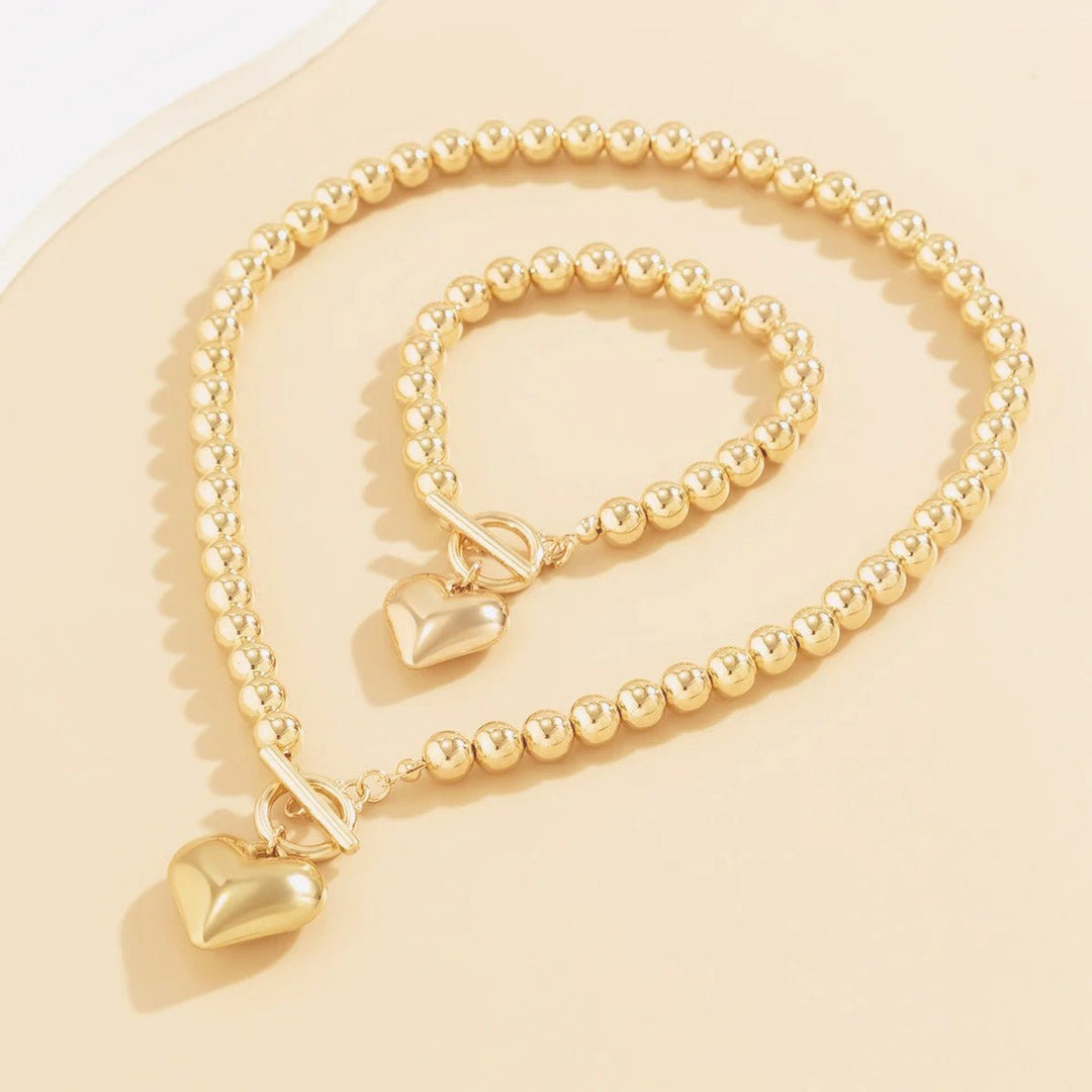 Conjunto de pulseira e colar com pendente em forma de coração em pérolas de 2 peças