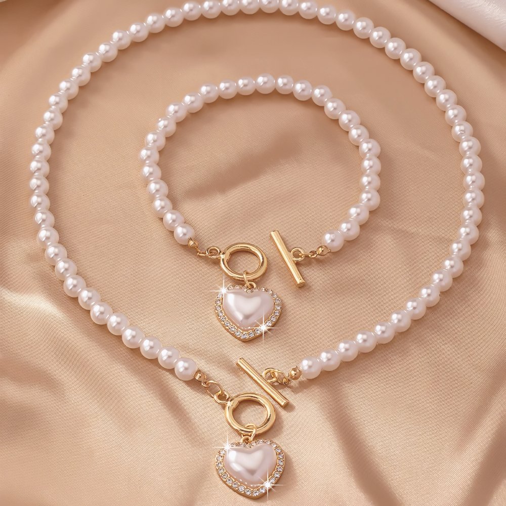 Conjunto de pulseira e colar com pendente em forma de coração em pérolas de 2 peças