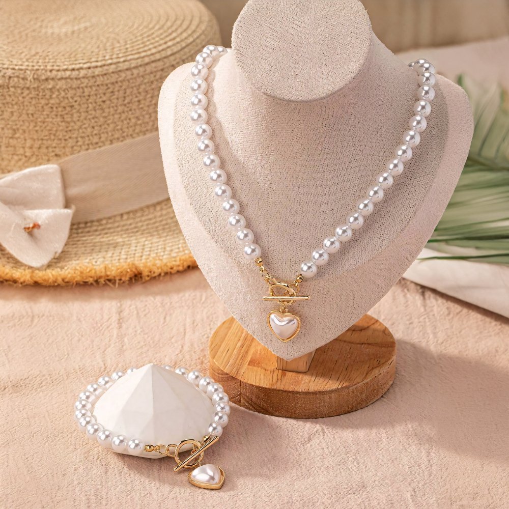 Conjunto de pulseira e colar com pendente em forma de coração em pérolas de 2 peças