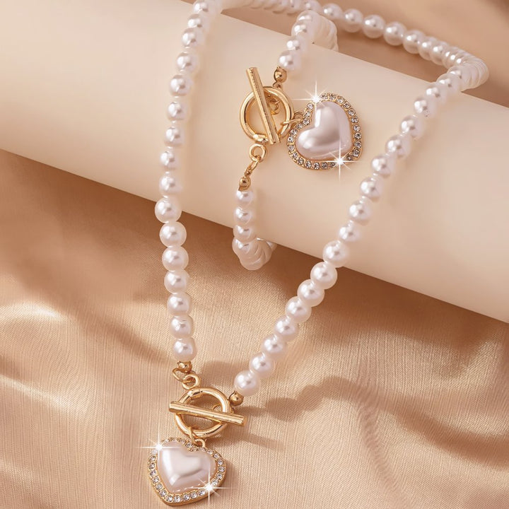 Conjunto de pulseira e colar com pendente em forma de coração em pérolas de 2 peças