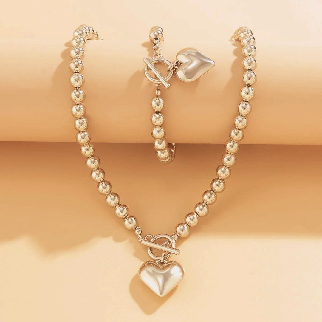 Conjunto de pulseira e colar com pendente em forma de coração em pérolas de 2 peças