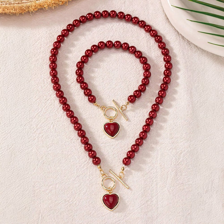 Conjunto de pulseira e colar com pendente em forma de coração em pérolas de 2 peças