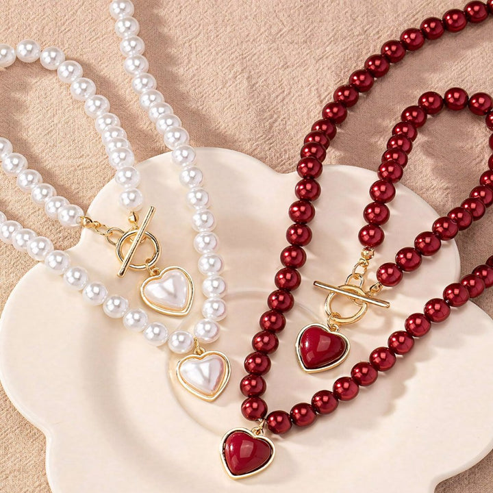 Conjunto de pulseira e colar com pendente em forma de coração em pérolas de 2 peças