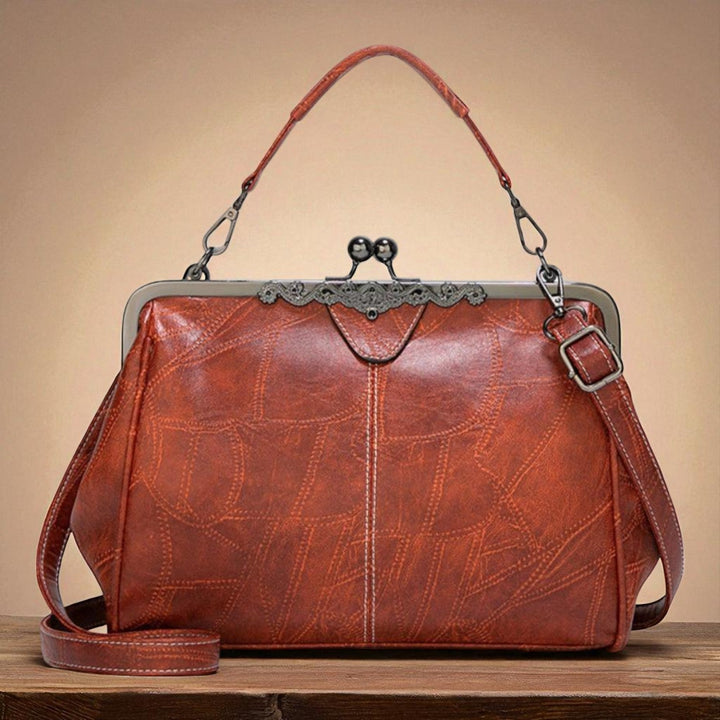 Bolso vintage com fecho a pressão