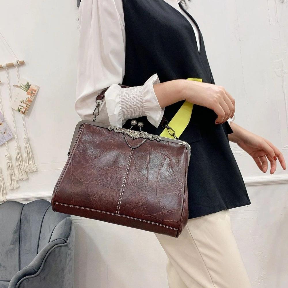 Bolso vintage com fecho a pressão