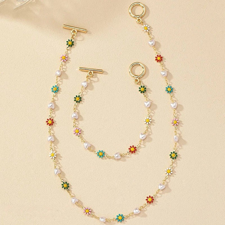 Conjunto de Pulseira e Colar de Pérolas Florais Primaveris Delicadas