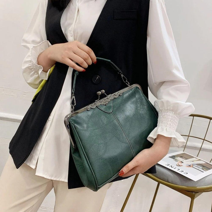 Bolso vintage com fecho a pressão